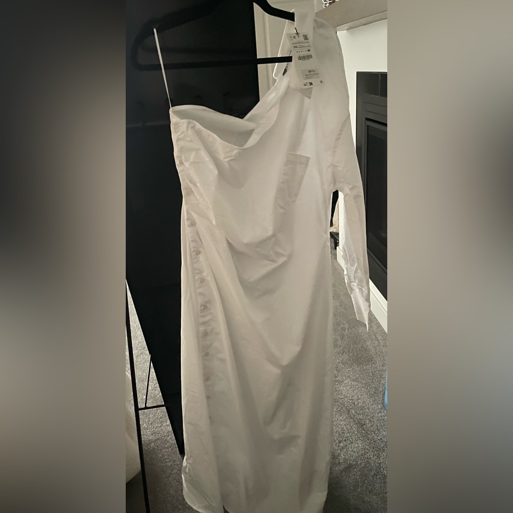 White slanted dress
